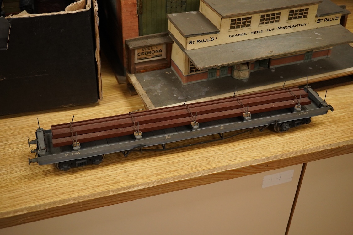 Eleven 0 gauge railway wooden freight wagons, wooden bodies and most possibly kit built using Bonds etc. parts, including a Leeds bogie mineral wagon, together with two kit or scratchbuilt wooden London Underground stati